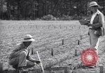 Image of farmer plows farm on tractor Savannah Georgia USA, 1939, second 42 stock footage video 65675037006