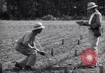 Image of farmer plows farm on tractor Savannah Georgia USA, 1939, second 49 stock footage video 65675037006