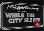 Image of trucks moving goods into city at night New York United States USA, 1940, second 23 stock footage video 65675037010