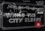 Image of trucks moving goods into city at night New York United States USA, 1940, second 26 stock footage video 65675037010