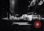 Image of trucks moving goods into city at night New York United States USA, 1940, second 61 stock footage video 65675037010