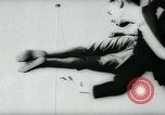 Image of magician levitates girl Hamburg Germany, 1962, second 45 stock footage video 65675037033
