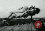 Image of magician levitates girl Hamburg Germany, 1962, second 48 stock footage video 65675037033