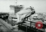 Image of magician levitates girl Hamburg Germany, 1962, second 56 stock footage video 65675037033
