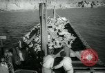 Image of building Aswan Dam Egypt, 1964, second 40 stock footage video 65675037039