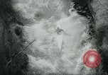 Image of White-Water Kayak race Europe, 1964, second 18 stock footage video 65675037040