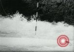 Image of White-Water Kayak race Europe, 1964, second 40 stock footage video 65675037040
