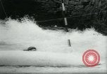 Image of White-Water Kayak race Europe, 1964, second 41 stock footage video 65675037040