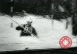 Image of White-Water Kayak race Europe, 1964, second 57 stock footage video 65675037040