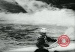 Image of White-Water Kayak race Europe, 1964, second 60 stock footage video 65675037040
