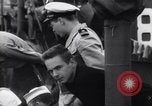 Standbild US Coast Guard Lieutenant Slip Crew vor dem D-Day Invasion England, 1944, aus Sekunde 34 historischem Filmmaterial Videoclip 65675037052