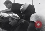 Standbild US Coast Guard Lieutenant Slip Crew vor dem D-Day Invasion England, 1944, aus Sekunde 51 historischem Filmmaterial Videoclip 65675037052
