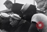 Standbild US Coast Guard Lieutenant Slip Crew vor dem D-Day Invasion England, 1944, aus Sekunde 53 historischem Filmmaterial Videoclip 65675037052