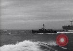 Image of Elements of Allied D-Day invasion fleet underway in World War II English Channel, 1944, second 5 stock footage video 65675037054