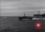 Image of Elements of Allied D-Day invasion fleet underway in World War II English Channel, 1944, second 8 stock footage video 65675037054