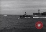 Image of Elements of Allied D-Day invasion fleet underway in World War II English Channel, 1944, second 9 stock footage video 65675037054
