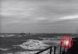 Image of Elements of Allied D-Day invasion fleet underway in World War II English Channel, 1944, second 18 stock footage video 65675037054