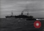 Image of Elements of Allied D-Day invasion fleet underway in World War II English Channel, 1944, second 21 stock footage video 65675037054