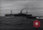 Image of Elements of Allied D-Day invasion fleet underway in World War II English Channel, 1944, second 22 stock footage video 65675037054