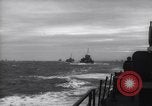 Image of Elements of Allied D-Day invasion fleet underway in World War II English Channel, 1944, second 29 stock footage video 65675037054