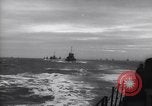 Image of Elements of Allied D-Day invasion fleet underway in World War II English Channel, 1944, second 35 stock footage video 65675037054