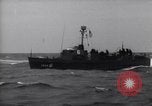 Image of Elements of Allied D-Day invasion fleet underway in World War II English Channel, 1944, second 36 stock footage video 65675037054