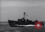 Image of Elements of Allied D-Day invasion fleet underway in World War II English Channel, 1944, second 38 stock footage video 65675037054