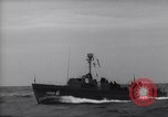 Image of Elements of Allied D-Day invasion fleet underway in World War II English Channel, 1944, second 39 stock footage video 65675037054