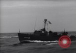 Image of Elements of Allied D-Day invasion fleet underway in World War II English Channel, 1944, second 42 stock footage video 65675037054