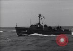 Image of Elements of Allied D-Day invasion fleet underway in World War II English Channel, 1944, second 43 stock footage video 65675037054
