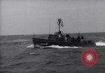 Image of Elements of Allied D-Day invasion fleet underway in World War II English Channel, 1944, second 46 stock footage video 65675037054