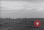 Image of Elements of Allied D-Day invasion fleet underway in World War II English Channel, 1944, second 54 stock footage video 65675037054