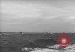 Image of Elements of Allied D-Day invasion fleet underway in World War II English Channel, 1944, second 57 stock footage video 65675037054