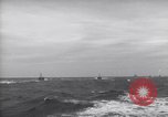 Image of Elements of Allied D-Day invasion fleet underway in World War II English Channel, 1944, second 58 stock footage video 65675037054