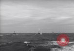 Image of Elements of Allied D-Day invasion fleet underway in World War II English Channel, 1944, second 60 stock footage video 65675037054
