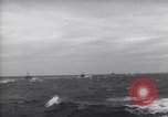 Image of Elements of Allied D-Day invasion fleet underway in World War II English Channel, 1944, second 61 stock footage video 65675037054