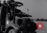 Image of U.S. war supplies come ashore at Normandy after D-Day Normandy France, 1944, second 7 stock footage video 65675037056