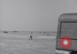 Image of U.S. war supplies come ashore at Normandy after D-Day Normandy France, 1944, second 13 stock footage video 65675037056
