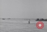 Image of U.S. war supplies come ashore at Normandy after D-Day Normandy France, 1944, second 15 stock footage video 65675037056
