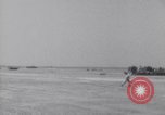 Image of U.S. war supplies come ashore at Normandy after D-Day Normandy France, 1944, second 16 stock footage video 65675037056