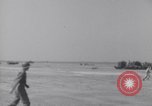 Image of U.S. war supplies come ashore at Normandy after D-Day Normandy France, 1944, second 17 stock footage video 65675037056