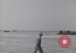 Image of U.S. war supplies come ashore at Normandy after D-Day Normandy France, 1944, second 18 stock footage video 65675037056