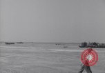 Image of U.S. war supplies come ashore at Normandy after D-Day Normandy France, 1944, second 19 stock footage video 65675037056