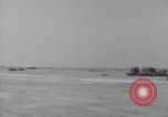 Image of U.S. war supplies come ashore at Normandy after D-Day Normandy France, 1944, second 20 stock footage video 65675037056