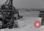 Image of U.S. war supplies come ashore at Normandy after D-Day Normandy France, 1944, second 32 stock footage video 65675037056