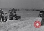 Image of U.S. war supplies come ashore at Normandy after D-Day Normandy France, 1944, second 36 stock footage video 65675037056
