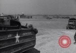 Image of U.S. war supplies come ashore at Normandy after D-Day Normandy France, 1944, second 42 stock footage video 65675037056