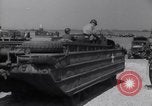 Image of U.S. war supplies come ashore at Normandy after D-Day Normandy France, 1944, second 45 stock footage video 65675037056