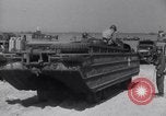 Image of U.S. war supplies come ashore at Normandy after D-Day Normandy France, 1944, second 46 stock footage video 65675037056