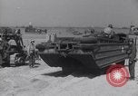 Image of U.S. war supplies come ashore at Normandy after D-Day Normandy France, 1944, second 48 stock footage video 65675037056